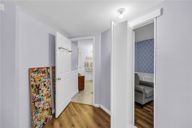 hallway with light wood-type flooring