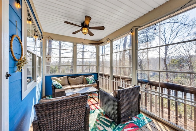 sunroom / solarium with ceiling fan