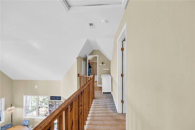 corridor with light carpet and ornamental molding