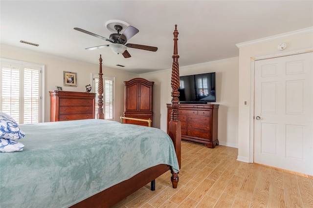 bedroom with light hardwood / wood-style floors, ceiling fan, and ornamental molding