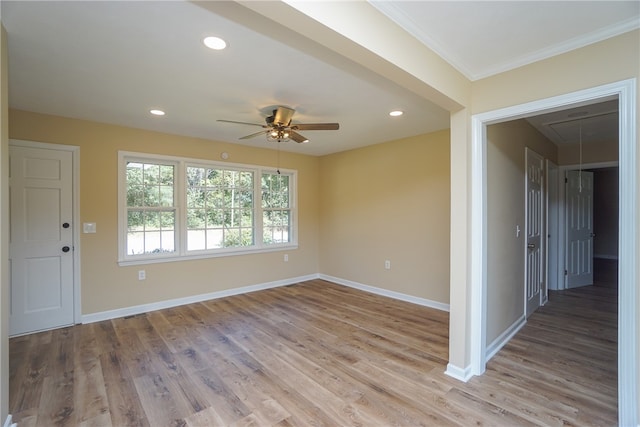 606 N Catherine St, Walhalla, SC 29691 - empty room with attic access, a ceiling fan, crown molding, light wood finished floors, and recessed lighting