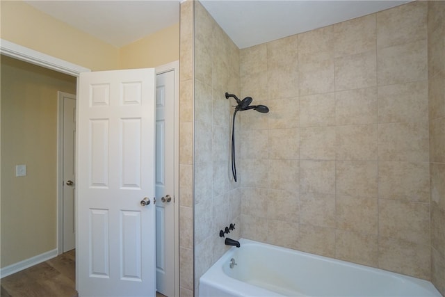 606 N Catherine St, Walhalla, SC 29691 - bathroom with bathtub / shower combination and wood finished floors