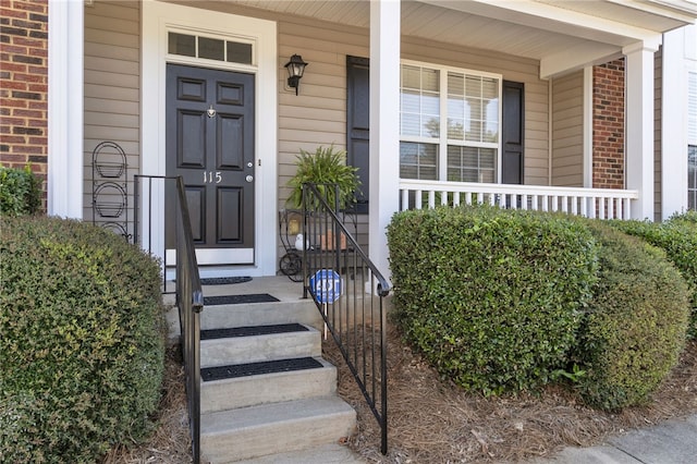 entrance to property with a porch