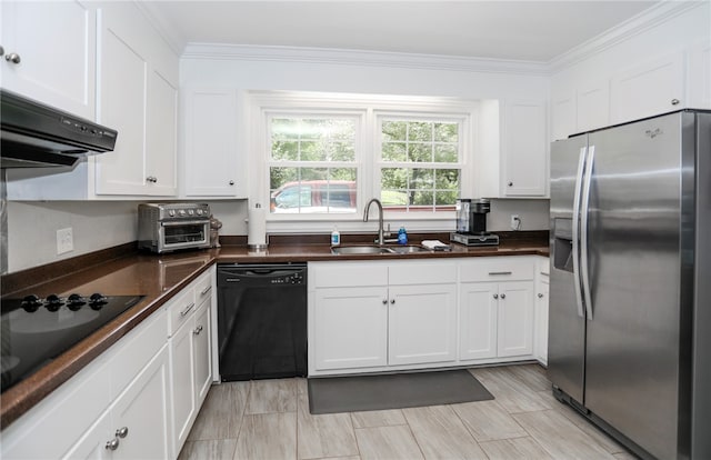 kitchen with ventilation hood, sink, white cabinetry, black appliances, and crown molding