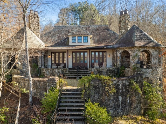 back of house with a porch