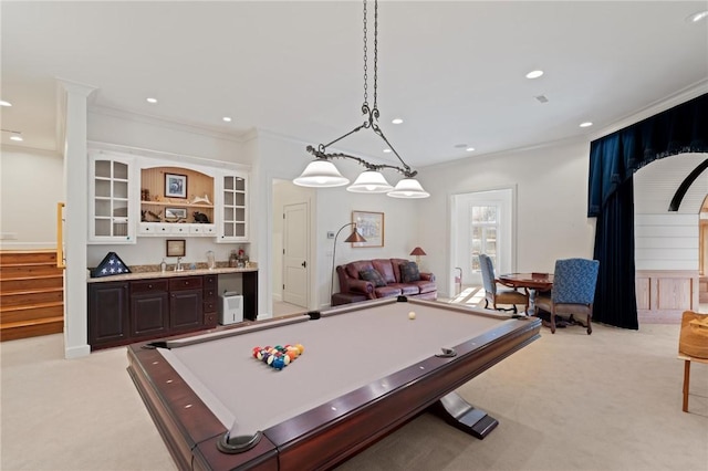 playroom with bar, light colored carpet, ornamental molding, and pool table