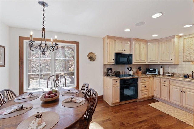 604 Top Ridge Dr, Sunset, SC 29685 - kitchen featuring black appliances, tasteful backsplash, a chandelier, and a sink
