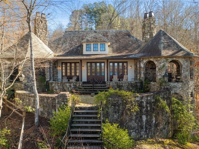 604 Top Ridge Dr, Sunset, SC 29685 - rear view of property with stairway, covered porch, a chimney, and french doors