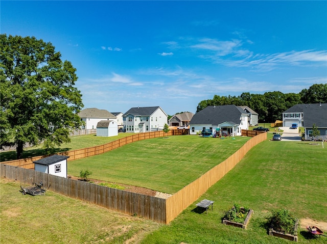 view of yard featuring a storage shed