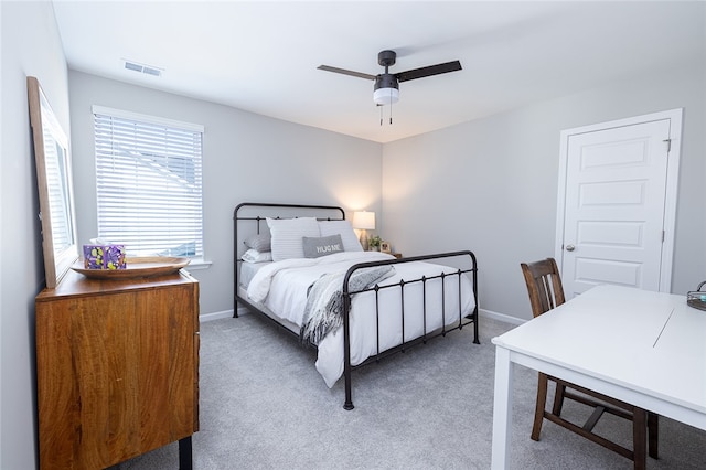 bedroom featuring ceiling fan and carpet floors