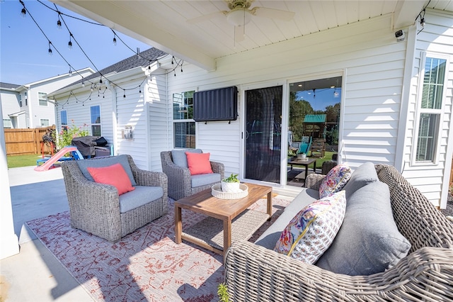 view of patio / terrace featuring area for grilling, outdoor lounge area, and ceiling fan