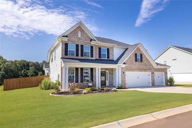 craftsman house with a front lawn, a porch, and a garage