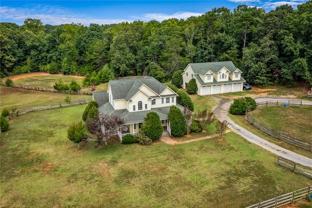 birds eye view of property featuring a rural view