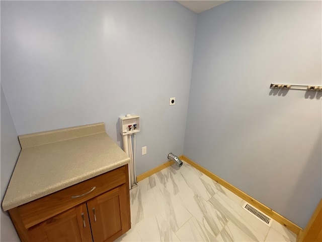 laundry room featuring hookup for a washing machine and electric dryer hookup