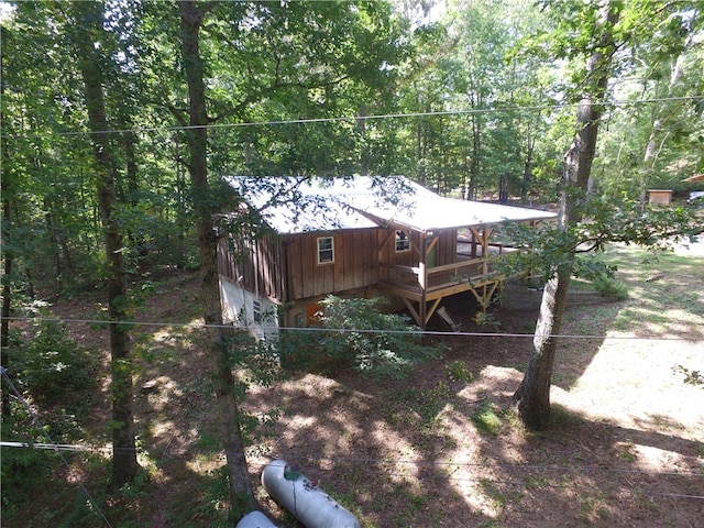 rear view of property with a deck