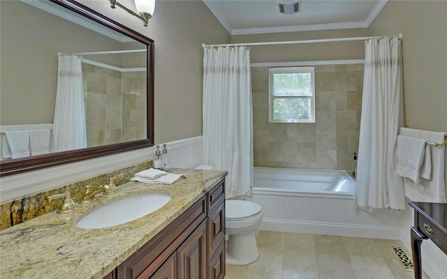 full bathroom with vanity, shower / tub combo, toilet, and crown molding