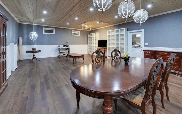 dining room with wood ceiling, ornamental molding, and dark hardwood / wood-style flooring