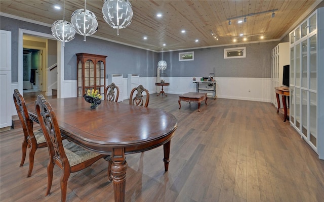 dining room featuring wood-type flooring and wood ceiling