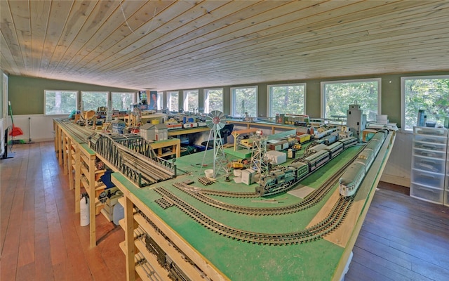 playroom with hardwood / wood-style flooring, lofted ceiling, and wood ceiling