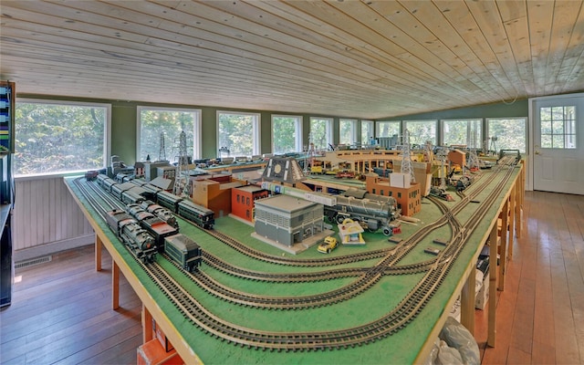 game room featuring hardwood / wood-style flooring, wood ceiling, and vaulted ceiling