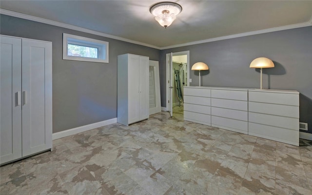 unfurnished bedroom featuring ornamental molding