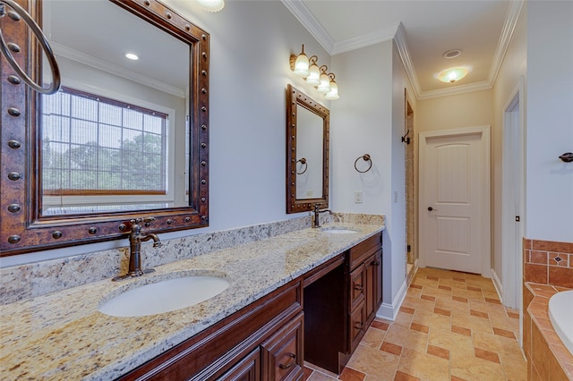 bathroom featuring tiled tub, vanity, and ornamental molding