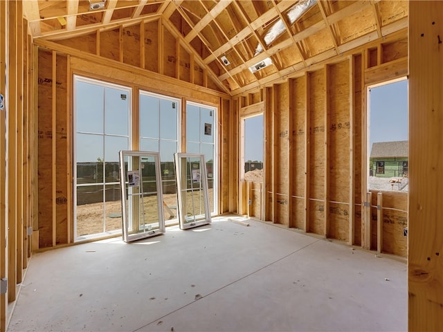 miscellaneous room featuring lofted ceiling