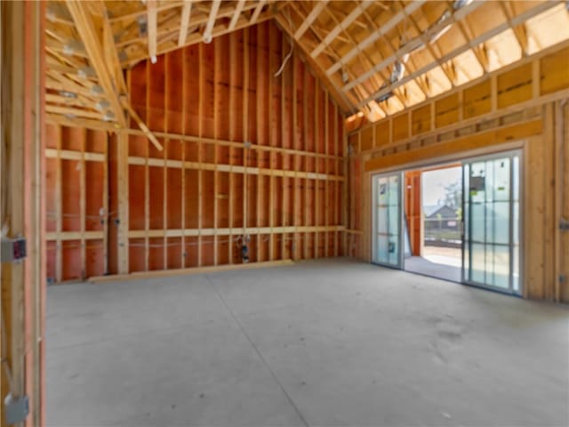 misc room with lofted ceiling