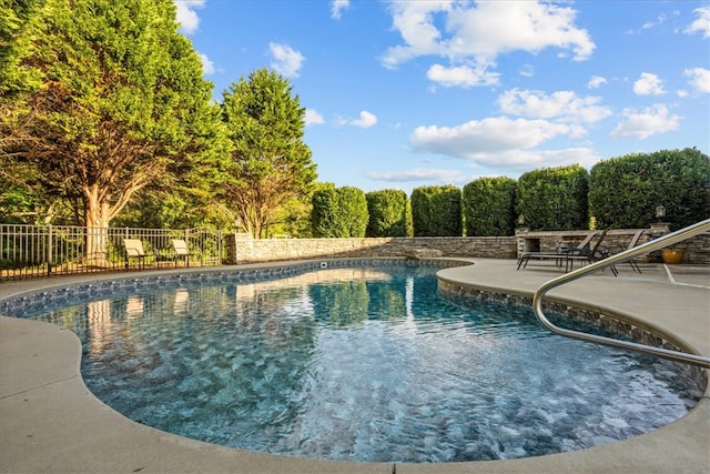 view of pool with a patio area