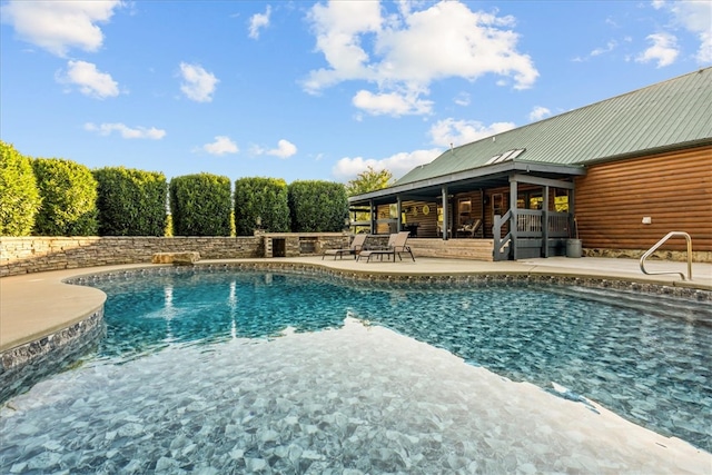 view of pool with a patio