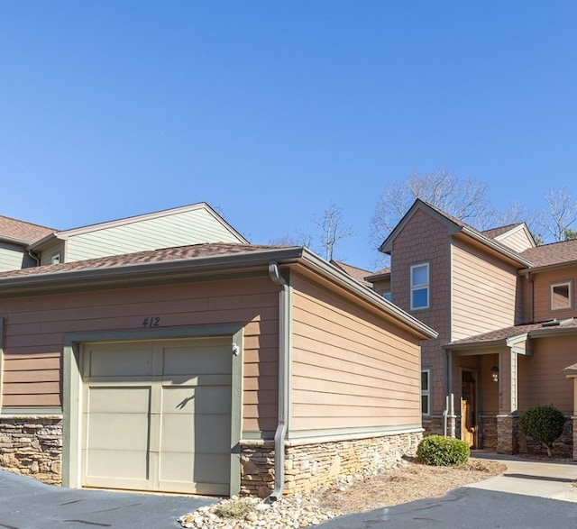 view of home's exterior with a garage