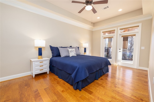 bedroom with ceiling fan, ornamental molding, light hardwood / wood-style floors, and access to outside