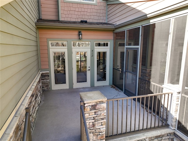 entrance to property with a patio