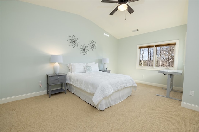 bedroom featuring vaulted ceiling, ceiling fan, and light colored carpet