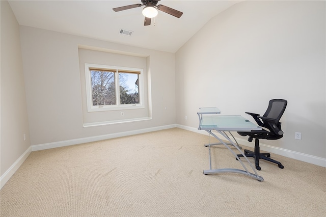 carpeted office featuring ceiling fan and vaulted ceiling