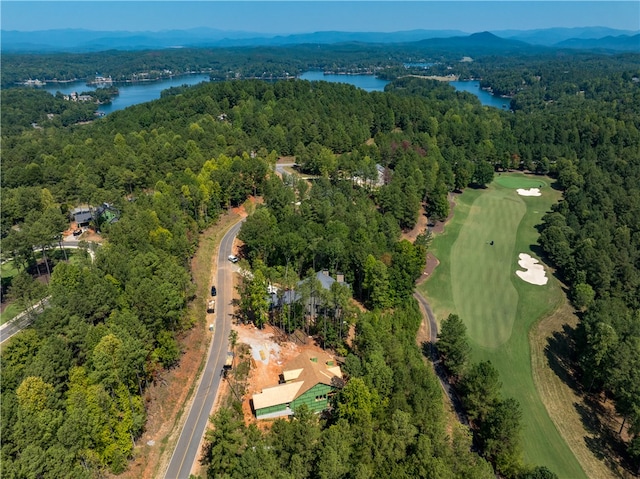 aerial view featuring a water and mountain view