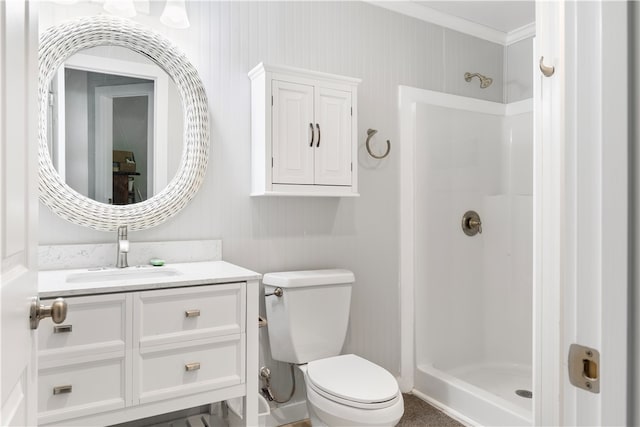 bathroom featuring crown molding, walk in shower, vanity, and toilet