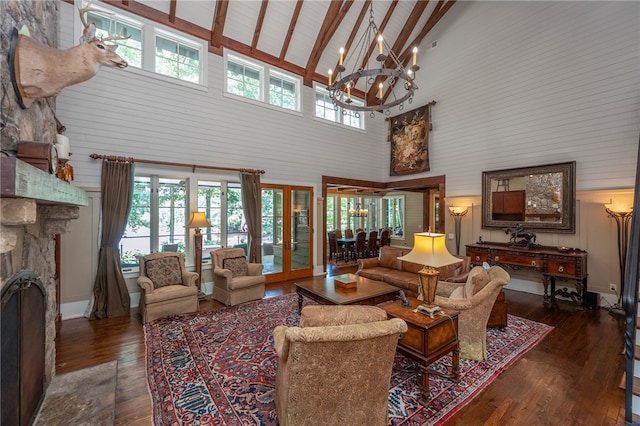 interior space with plenty of natural light, french doors, and high vaulted ceiling