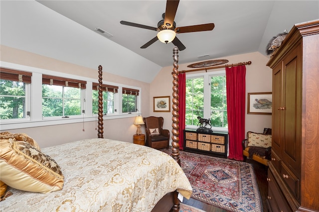 bedroom featuring vaulted ceiling, ceiling fan, and hardwood / wood-style floors