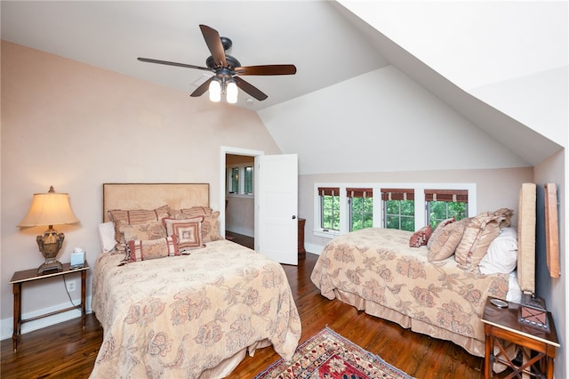 bedroom featuring lofted ceiling, ceiling fan, and dark hardwood / wood-style flooring