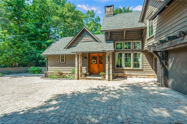 exterior space with a garage