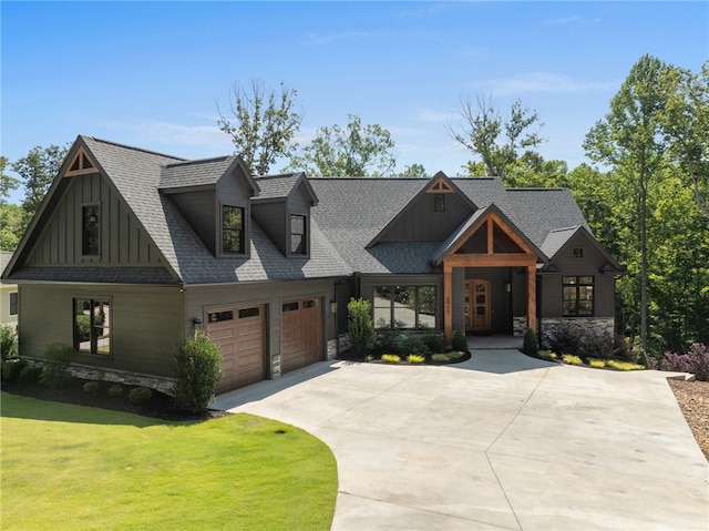 view of front facade featuring a garage and a front lawn