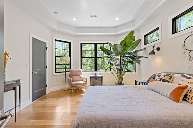 bedroom with light hardwood / wood-style flooring