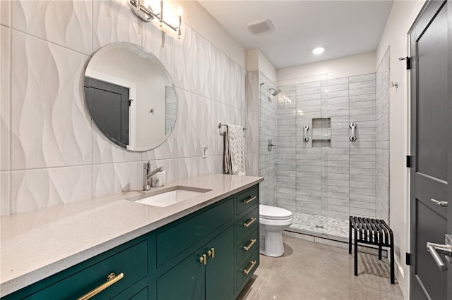 bathroom featuring walk in shower, backsplash, toilet, vanity, and tile walls