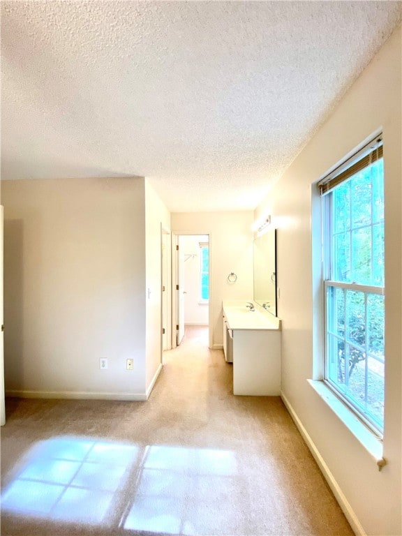 bathroom with a textured ceiling