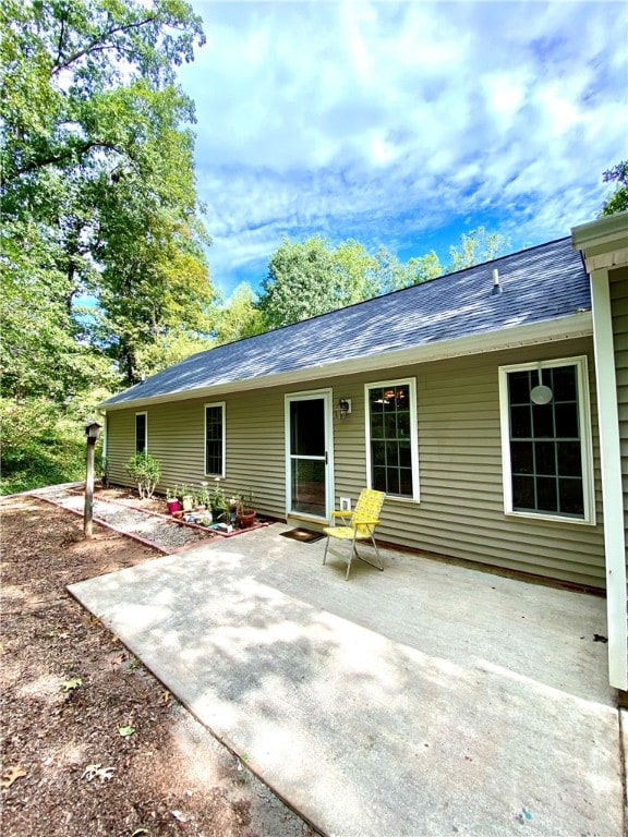 rear view of property with a patio