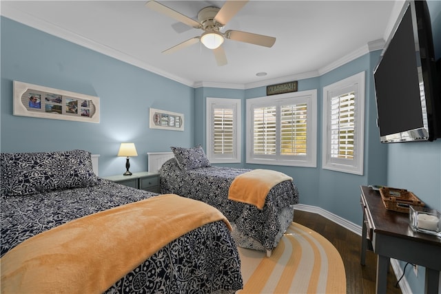 bedroom featuring ceiling fan, dark hardwood / wood-style floors, and ornamental molding