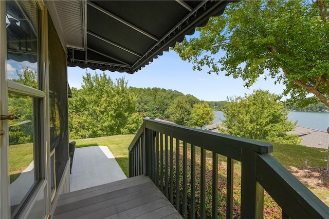 balcony featuring a water view