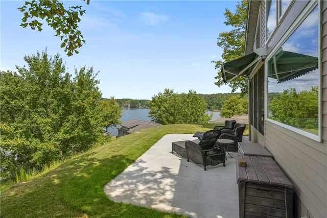 view of patio / terrace with a water view