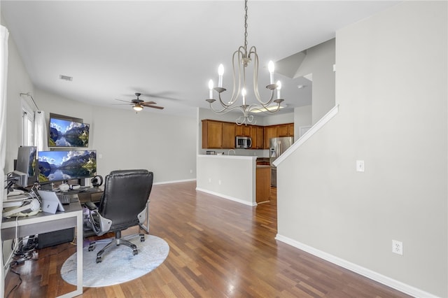 office space with ceiling fan with notable chandelier and dark hardwood / wood-style floors